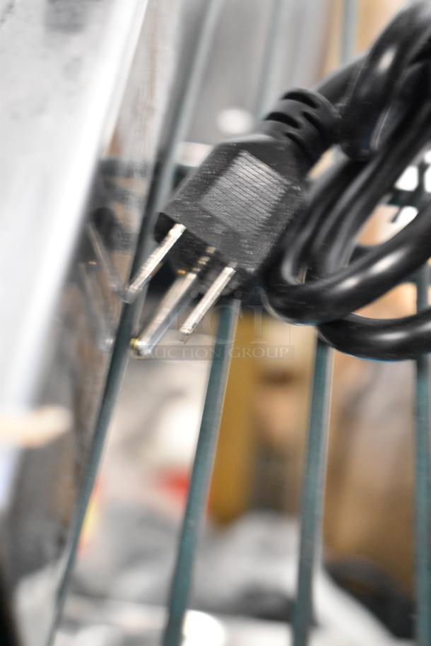 Close-up of a power plug for the Town 56918 92 Cup Commercial Rice Warmer, showcasing its compatibility with 120 volts, 1 phase.