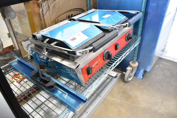 Brand new 2023 Avantco 177PG400GS stainless steel dual panini grill, grooved top, smooth bottom, 19 5/8" x 9 1/8" surface.