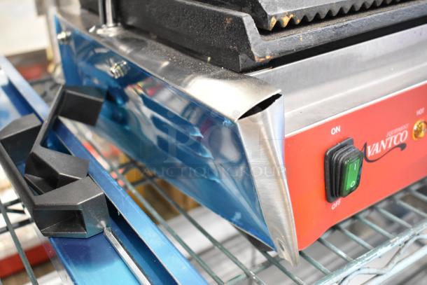 BRAND NEW Avantco 177PG400GS Dual Panini Grill, stainless steel, 19 5/8" x 9 1/8" surface, grooved and smooth plates, 120V.