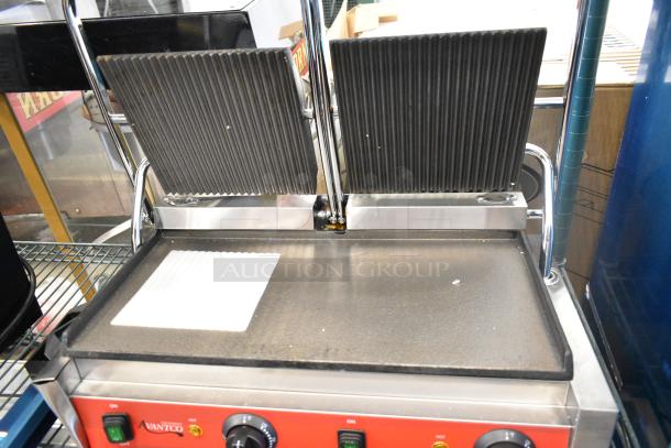 Brand new Avantco 177PG400GS dual panini grill, grooved top, smooth bottom, 19 5/8"x9 1/8" surface, 120V, 1 phase.