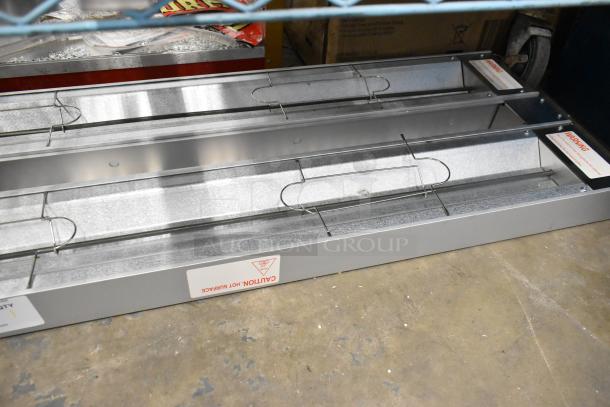 BRAND NEW ServIt 423SW48INHDBLA 48" Double Strip Warmer, dual controls, 120V, slight dents, caution labels visible.