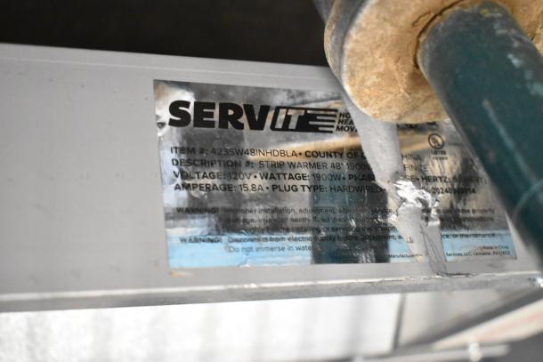 Brand new ServIt 423SW48INHDBLA 48" double strip warmer label, showing 120V, 1900W, 1 phase, hardwired.