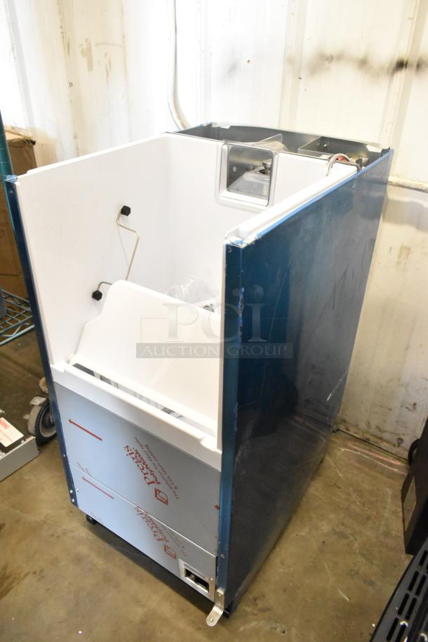Brand new Hoshizaki C-80BAK-AD stainless steel undercounter ice machine with 27 lb. bin, minimal scratches.