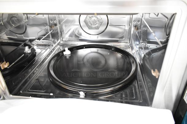 KoolMore KM-CWO24-SS stainless steel convection oven microwave interior, 1.5 cu. ft., pristine condition, minor surface dents.