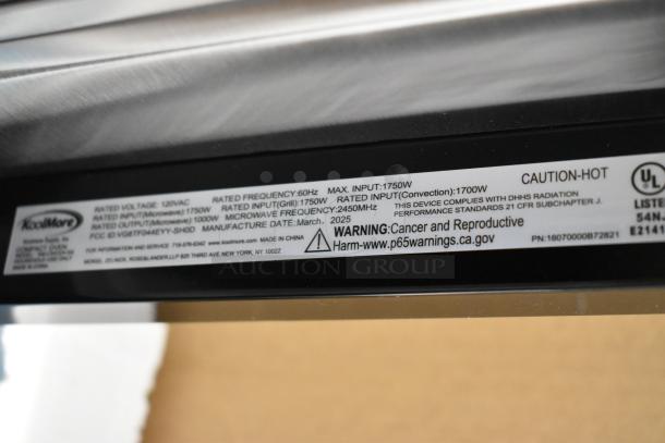 Stainless steel KoolMore KM-CWO24-SS, 2025 convection oven with microwave, 1.5 cu. ft., 120V. Tag shows specs and warnings.