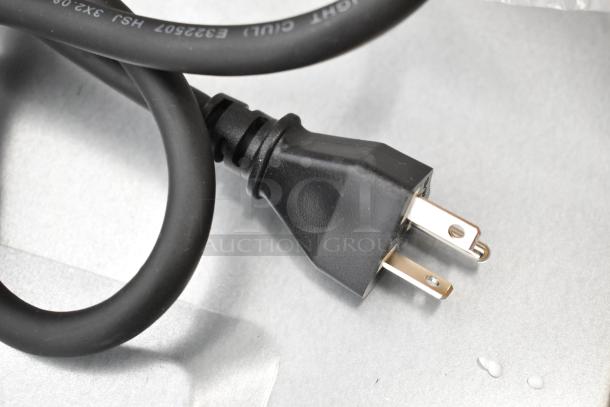 Black power cord with a two-prong plug, no other identifiable features visible.
