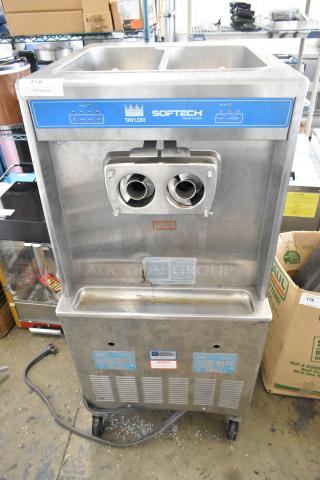 Taylor 754-27 Stainless Steel Commercial Floor Style 2 Flavor w/ Twist Soft Serve Ice Cream Machine on Commercial Casters. 208/230 Volts, 1 Phase. - Item #1199501