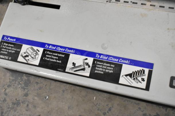 Lot of various items including a sign and a credit card reader. Visible instructions depict steps to bind using a comb.