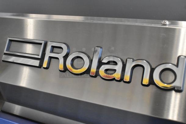 Soljet Pro III XC-540 large format printer on casters, 100-120V, 1 phase, with Roland branding on stainless steel casing.