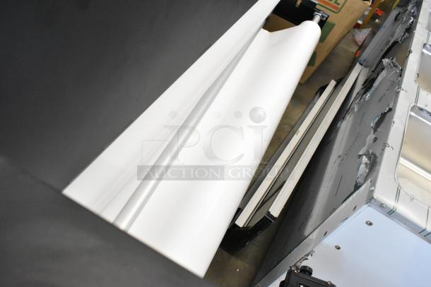 Soljet Pro III XC-540 large format printer on casters, 100-120V, 1 phase. Shows rolls of media, metallic side panel detail.