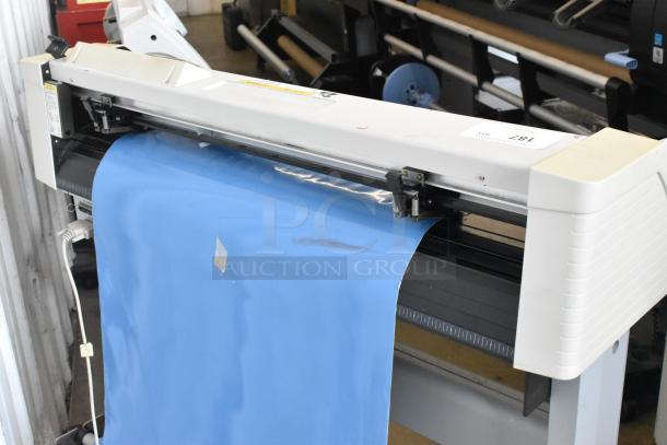 Mimaki CG-60EX Cutting Plotter, 120V, 1 Phase, in working condition, includes blue material roll.