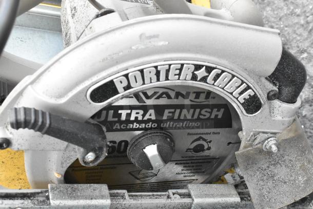 SawTrax metal frame with Porter Cable 324MAG 7-1/4" heavy-duty circular saw, showing blade details and brand logo.