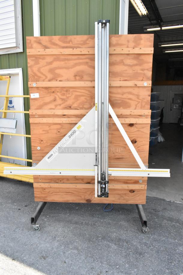 Fletcher 3100 63" multi-material cutter on commercial casters, mounted on wooden board. Visible label indicates model name.