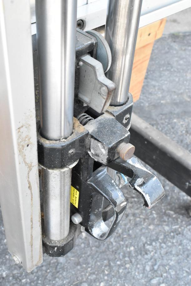 Fletcher 3100 63" multi-material cutter, detailed view of mechanism, on commercial casters, in used condition.