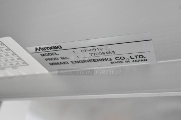 Mimaki CF-0912-2 Flatbed Cutter showing model and production number label, made in Japan.