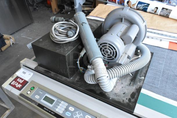 Mimaki CF-0912-2 Flatbed Cutter, includes control panel, visible wear, "Bad Blade" label on surface, industrial setting.