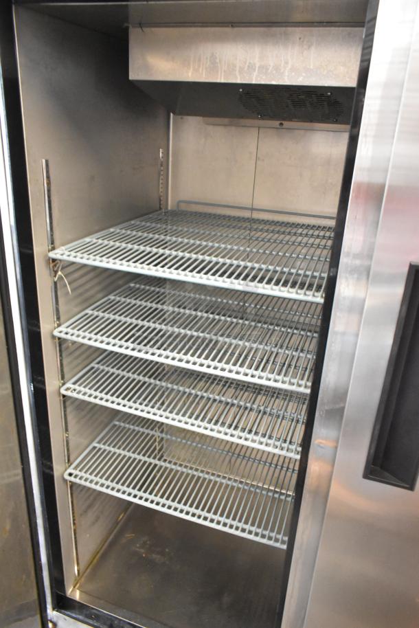 Dukers D55AR stainless steel 2-door reach-in cooler with poly-coated racks, commercial casters, 115V, 1-phase.