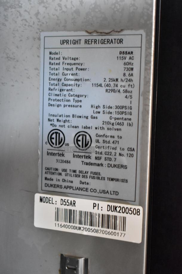 Dukers D55AR commercial 2-door cooler with poly coated racks on casters. 115V, 1 phase. Model shown on label.