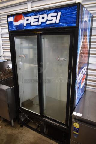 True GDM-37 Metal Commercial 2 Door Reach In Cooler Merchandiser. 115 Volts, 1 Phase.