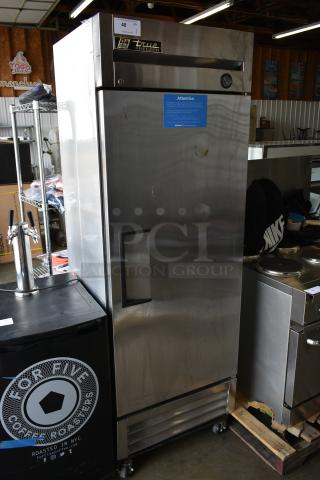 True T-19F  Stainless Steel Commercial Single Door Reach In Freezer w/ Poly Coated Racks. 115 Volts, 1 Phase.