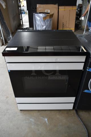 2024 Samsung Metal Commercial Electric Powered 4 Burner Range w/ Convection Oven. See Pictures for Damage To Cook Top,