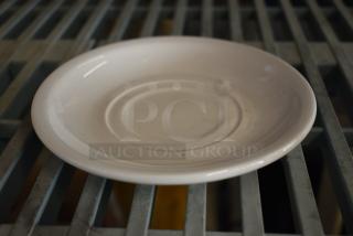 Box of White Ceramic Saucers.