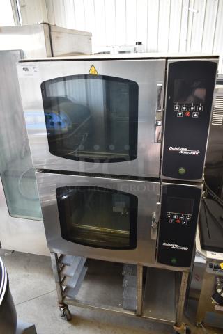 2 Belshaw Adamatic Mono FG189-UZ82 Stainless Steel Commercial Electric Powered Convection Oven on Pan Rack w/ Commercial Casters. 208/220 Volts, 1 Phase. 2 Times Your Bid!