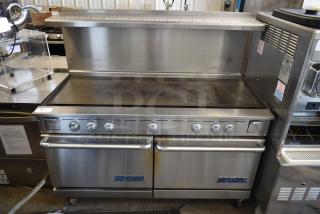 Imperial Stainless Steel Commercial Flat Top Griddle w/ 2 Ovens, Over Shelf and Back Splash on Commercial Casters.