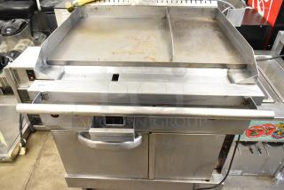 Stainless Steel Commercial Gas Powered Flat Top Griddle w/ CONVECTION Oven on Commercial Casters.