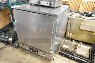 Winston HC4009GE CVap  Stainless Steel Commercial Single Door Undercounter Warming Cabinet on Commercial Casters. 120 Volts, 1 Phase.