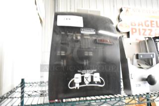 Kimberly Clark Black Poly Wall Mount Paper Towel Dispenser.