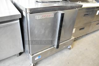 Blodgett Zephaire-100-E Stainless Steel Commercial Electric Powered Full Size Convection Oven w/ Solid Doors, Metal Oven Racks, Thermostatic Controls and Commercial Casters. 208 Volts, 3 Phase.