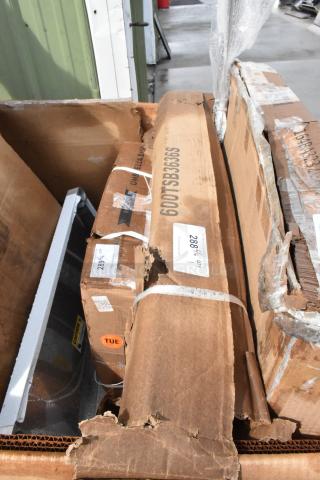 BRAND NEW SCRATCH AND DENT! Regency 600TSB3636S 36" x 36" 16 Gauge Stainless Steel Commercial Work Table with 4" Backsplash and Undershelf