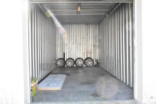 ALL ONE MONEY! Lot of Entire Contents of Storage Unit #53. Unit Appears to Contain: Doors, X-Large Dog Pads, 4 Rims w/ Tires. Cleaning Deposit of $100 per Unit Paid on Pickup Day. Winner Has 7 Days From Close of Auction to Remove Items. All Items Must Be Removed and Unit Must Be Broom Swept to Get Cleaning Deposit Returned.