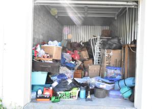 ALL ONE MONEY! Lot of Entire Contents of Storage Unit #57. Unit Appears to Contain: Wooden Dining Room Chairs, Laundry Basket, Poly Storage Bins, Display Case. Cleaning Deposit of $100 per Unit Paid on Pickup Day. Winner Has 7 Days From Close of Auction to Remove Items. All Items Must Be Removed and Unit Must Be Broom Swept to Get Cleaning Deposit Returned.