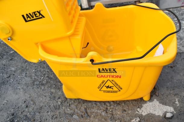 BRAND NEW SCRATCH AND DENT! 274MOPBCKTYE Lavex 35 Qt. Yellow Mop Bucket & Side Press Wringer Combo - Image 6 of 7