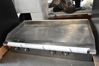 BRAND NEW SCRATCH AND DENT! APW Wyott Stainless Steel Commercial Countertop Gas Powered Flat Top Griddle.