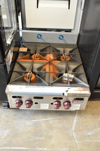 BRAND NEW SCRATCH AND DENT! Wolf AHP424-1 Stainless Steel Commercial Natural Gas Powered 24" 4 Burner Countertop Range - 120,000 BTU.