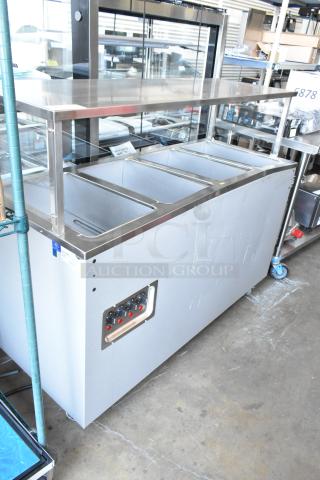 BRAND NEW SCRATCH AND DENT! Vollrath 39730A Stainless Steel Commercial Electric Powered 4 Well Steam Table. 120 Volts, 1 Phase.