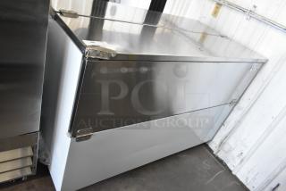 BRAND NEW SCRATCH AND DENT! 2024 Avantco 178MC58HC 58" School Milk Cooler on Commercial Casters. 115 Volts, 1 Phase.