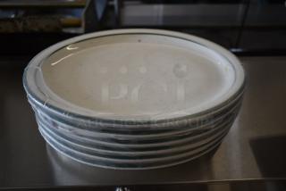 BRAND NEW SCRATCH AND DENT! Box of 12 Tuxton TES-013 Emerald 11 1/2" x 9 1/8" Green Speckle Narrow Rim Oval China Platter