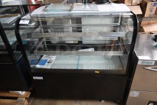 BRAND NEW SCRATCH AND DENT! Avantco 193BC48HCB 48" Curved Glass Black Refrigerated Bakery Display Case on Commercial Casters. See Pictures for Glass Damage. 110-120 Volts, 1 Phase.