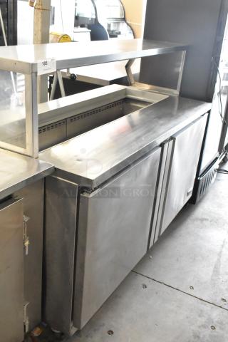 Fagor FST-60-16 Stainless Steel Prep Table w/ Over Shelf on Commercial Casters. 115 Volts, 1 Phase. Tested and Powers On But Does Not Get Cold