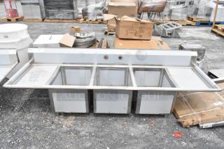 BRAND NEW SCRATCH AND DENT! Regency 600S31824218 94" 16 Gauge Stainless Steel Three Compartment Commercial Sink with  2 Drainboards - 18" x 24" x 14" Bowls. No Legs.