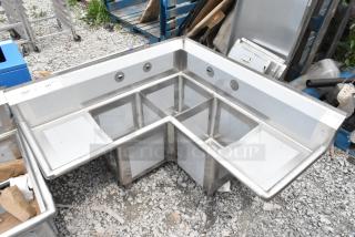 BRAND NEW SCRATCH AND DENT! Regency 600S3141414C 16 Gauge Stainless Steel Three Compartment Commercial Corner Sink with Two Drainboards.