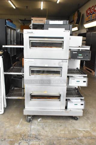 3 Lincoln Impinger 1132-002-U-K1841 Stainless Steel Commercial Electric Powered Conveyor Pizza Oven on Commercial Casters. 208/240 Volts, 1 Phase. 3 Times Your Bid! - Item #1190929