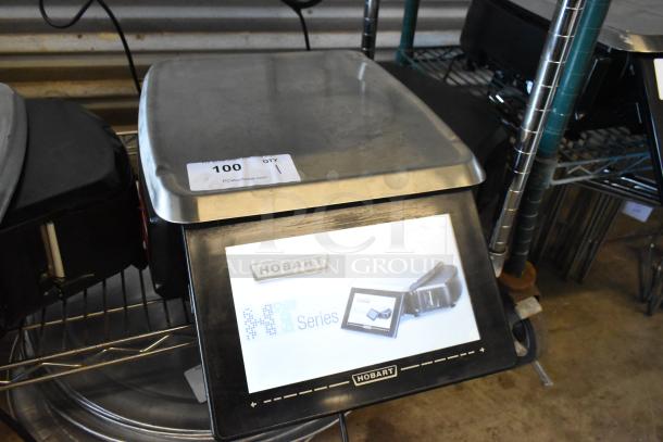 Hobart HT Series digital scale, stainless steel, used condition, auction lot tag 100, PCI Auctions label visible.