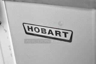 Hobart Legacy Metal Commercial Floor Style Planetary Dough Mixer w/ Stainless Steel Mixing Bowl, Bowl Guard, Whisk and Dough Hook Attachment.