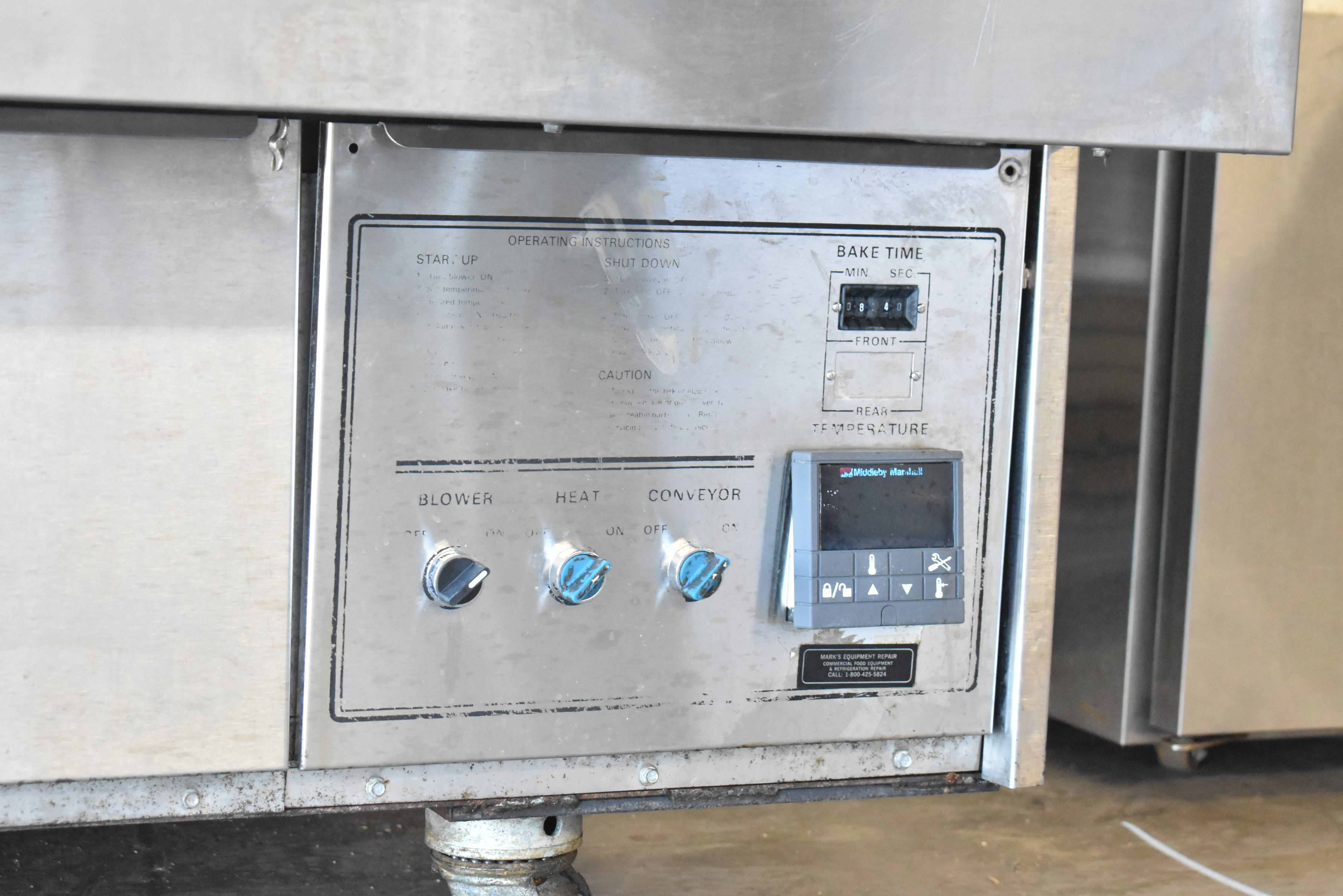 Middleby Marshall control panel showing temperature and timer settings for conveyor operation