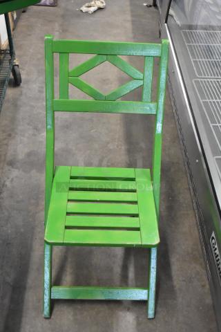 7 Green Folding Chairs. 7 Times Your Bid!